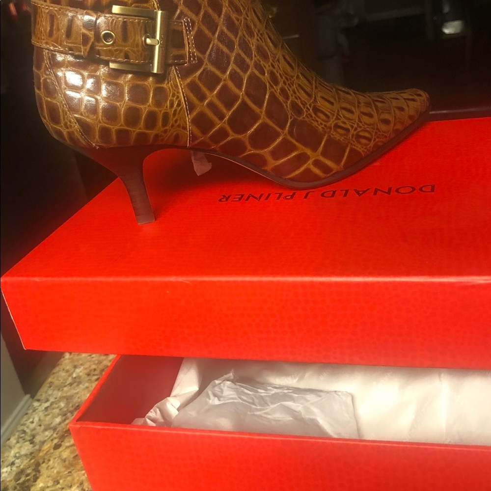 Donald Pliner croc embossed low cut booties.